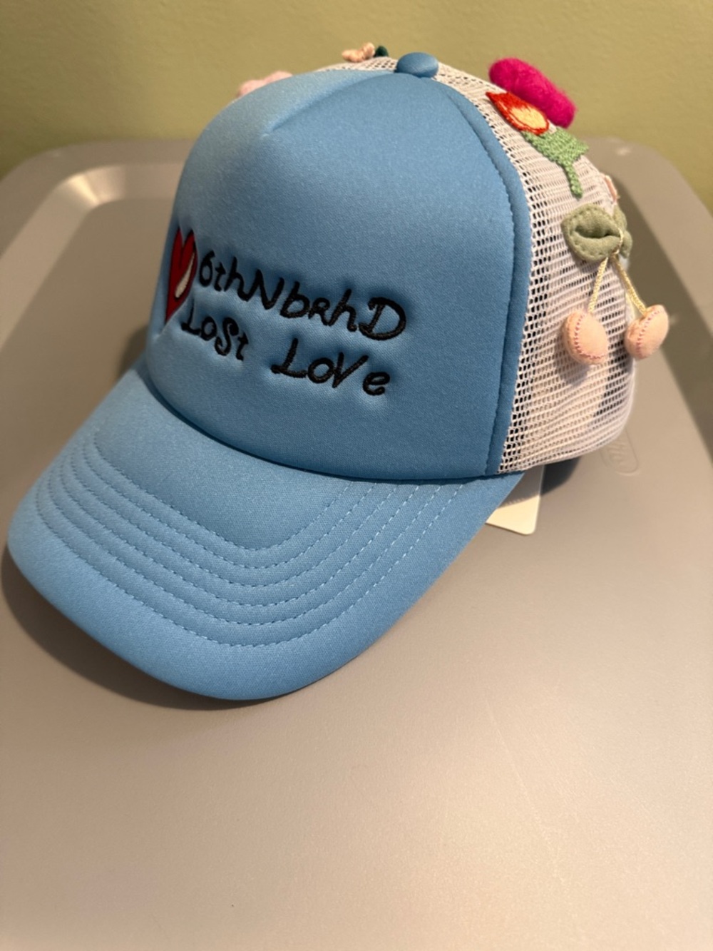 6thNBRHD Blue Floral Mesh Trucker Hat